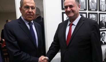 Russia's Foreign Minister Sergei Lavrov (L) and Israel's Foreign Minister Yisrael Katz shake hands during a meeting on the sidelines of the 74th session of the UN General Assembly at the headquarters of the United Nations in Manhattan. 