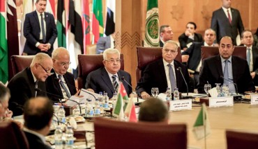 Palestinian president Mahmud Abbas (3rd-L) and Palestine Liberation Organisation (PLO) Secretary-General Saeb Erekat (2nd-L) look on as Arab League Secretary-General Ahmed Aboul Gheit (L) reads a statement during an Arab League emergency meeting discussing the US-brokered proposal for a settlement of the Middle East conflict, at the league headquarters in the Egyptian capital Cairo on February 1, 2020.