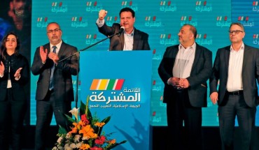 Ayman Odeh (C), leader of the Hadash party that is part of the Joint List alliance, gives an address with other alliance leaders at their electoral headquarters in Israel's northern city of Shefa-Amr on March 2, 2020, after polls officially closed.