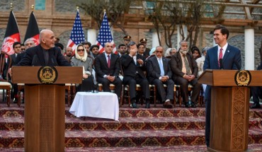 Afghanistan's President Ashraf Ghani (L) speaks as US Secretary of Defense Mark Esper (R) listens during a press conference at the presidential palace in Kabul on February 29, 2020. - The United States signed a landmark deal with the Taliban on February 29, laying out a timetable for a full troop withdrawal from Afghanistan within 14 months as it seeks an exit from its longest-ever war. (Photo by WAKIL KOHSAR / AFP)