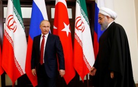 Russian President Vladimir Putin (L) and Iranian President Hassan Rouhani (R) attend the trilateral summit to discuss progress on Syria, between the Presidents of Turkey, Russia and Iran on November 22, 2017 in Sochi, Russia.