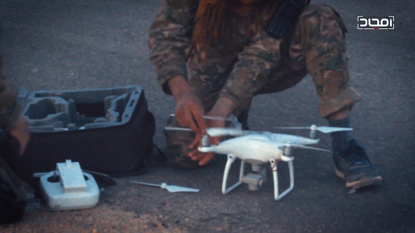 A DJI quadcopter drone operated by an HTS member. From an Amjad video release.