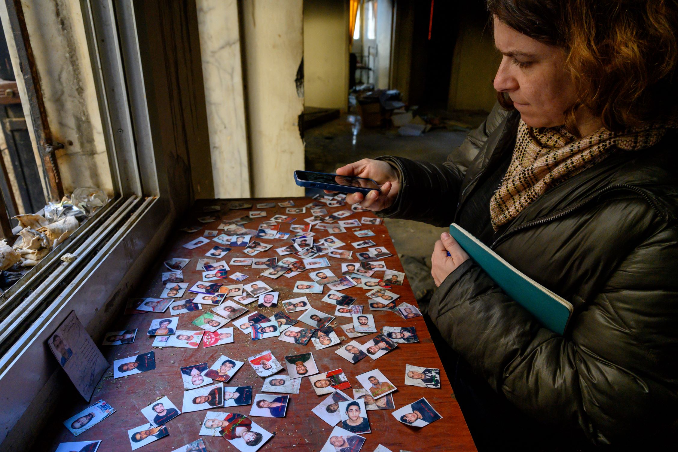 Photo above: Images of passport photos at Syria’s Palestine Branch, Dec. 17, 2024. Photo by Scott Peterson via Getty Images.