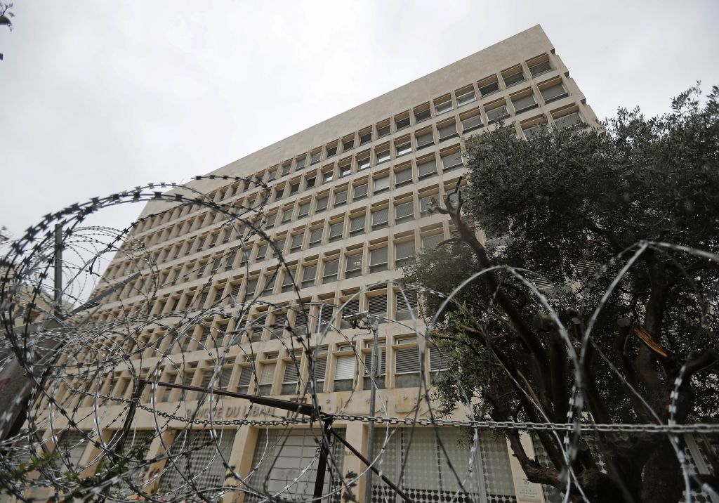 Barbed wire blocks the vicinity of Lebanon's central bank building in the capital Beirut on March 6, 2020. - Lebanon's central bank today ordered money changers to cap their exchange rate at no more than 30 percent above the official peg to contain the pound's devaluation on the parallel market. Debt-ridden Lebanon is facing its most serious economic crisis since the end of its 1975-1990 civil war. (Photo by JOSEPH EID / AFP) (Photo by JOSEPH EID/AFP via Getty Images)