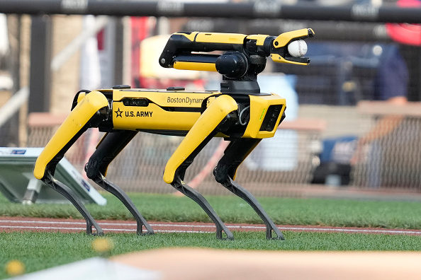 Spot, a US Army robot from Boston Dynamics, delivers the game ball before a Washington-Arizona game at Nationals Park on June 18, 2024. Photo by Mitchell Layton/Getty Images.