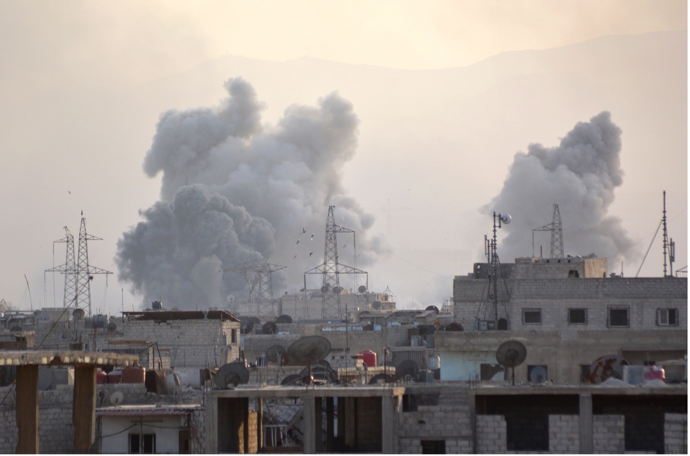 Image 1: Assad regime’s airstrikes over Yarmouk refugee camp, April 24, 2018. Photo by Rami Alsayed/Anadolu Agency via Getty Images