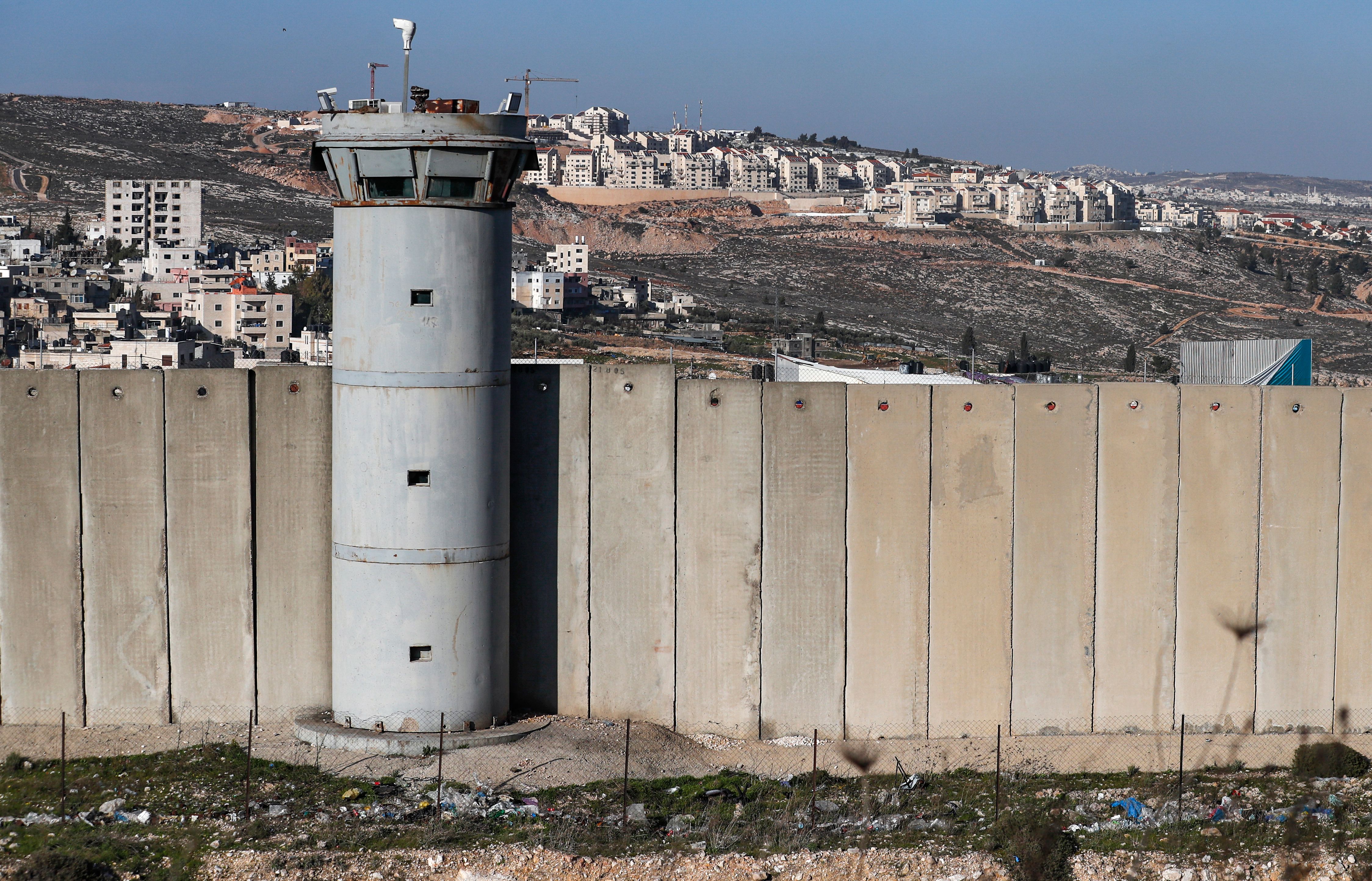 A view of Israel’s separation barrier on the outskirts of Israeli-annexed East Jerusalem 