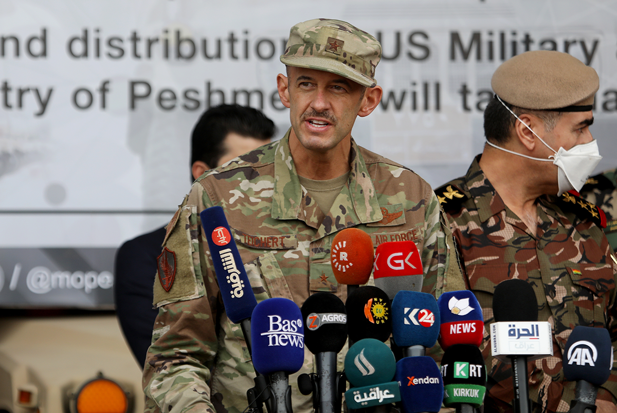 Brig. Gen. E. John Teichert speaks during a ceremony held for the delivery of armored vehicles, logistics, and other military supplies sent by the U.S. for the 14th and 16th Infantry Brigades of the Peshmerga forces in Erbil, Iraq on November 10, 2020. Photo by Yunus Keles/Anadolu Agency via Getty Images.