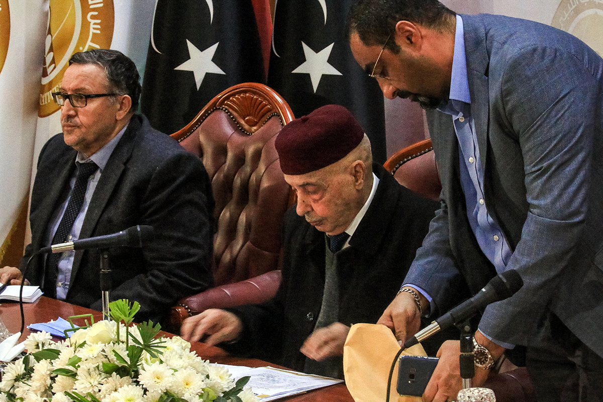 Aguila Saleh Issa (C), speaker of the Tobruk-based Libyan House of Representatives, meets with Ali al-Hibri (L), then governor of the parallel eastern Central Bank of Libya, in Benghazi on Dec. 6, 2020. Photo by ABDULLAH DOMA/AFP via Getty Images.