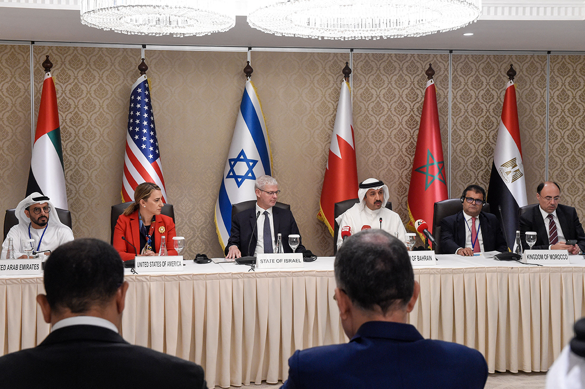 Photo above: Government officials from the UAE, the U.S., Israel, Bahrain, Morocco, and Egypt hold a joint press conference for the Negev Forum first Steering Committee meeting in Zallaq, south of Bahrain’s capital of Manama, on June 27, 2022. Photo by MAZEN MAHDI/AFP via Getty Images.