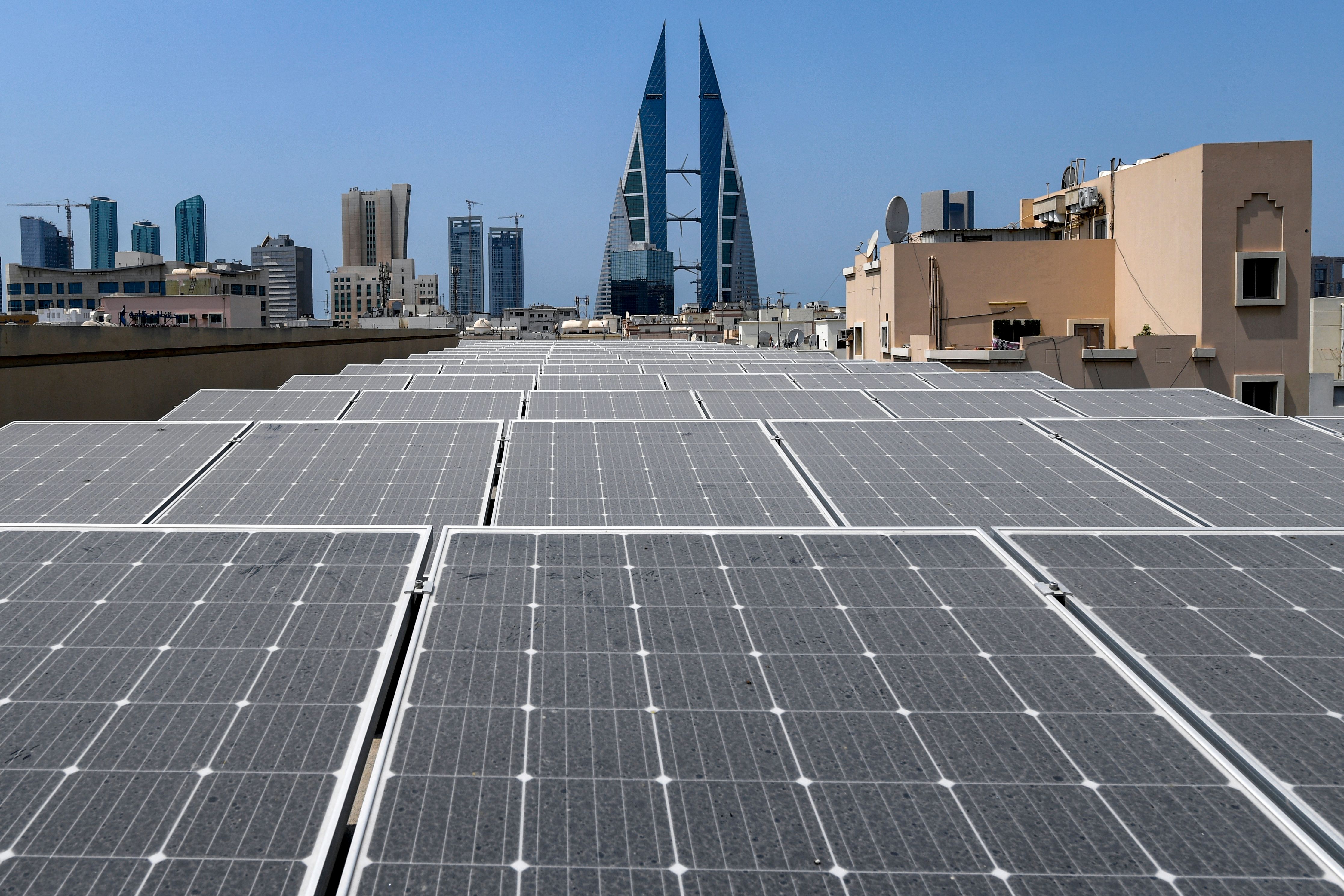 Solar panels are installed on the roof of a school in Bahrain’s capital Manama on Aug. 25, 2022. Photo by MAZEN MAHDI/AFP via Getty Images.