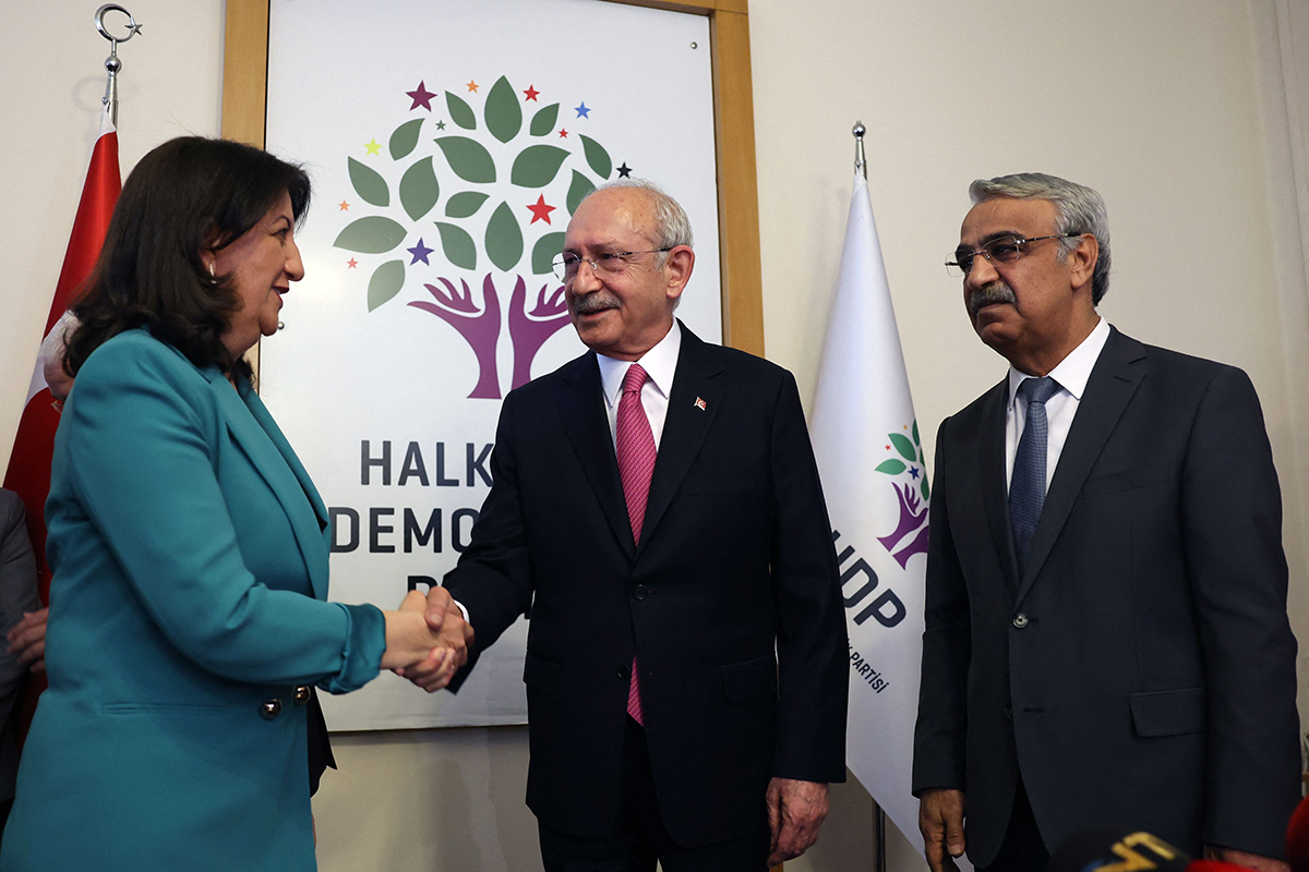 Republican People’s Party (CHP) chairman Kemal Kılıçdaroğlu (C) and Peoples’ Democratic Rights Party (HDP) co-chairs Pervin Buldan (L) and Mithat Sancar (R) hold a press conference in Ankara on March 20, 2023. Photo by ADEM ALTAN/AFP via Getty Images.