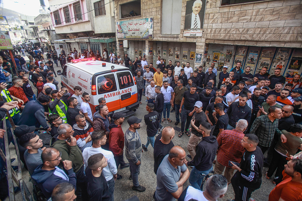 Photo above: Red Crescent ambulances transport two Palestinians who were shot dead by the Israeli army in Balata refugee camp during a raid on the camp, east of Nablus, in the occupied West Bank on May 13, 2023. Photo by Nasser Ishtayeh/SOPA Images/LightRocket via Getty Images.