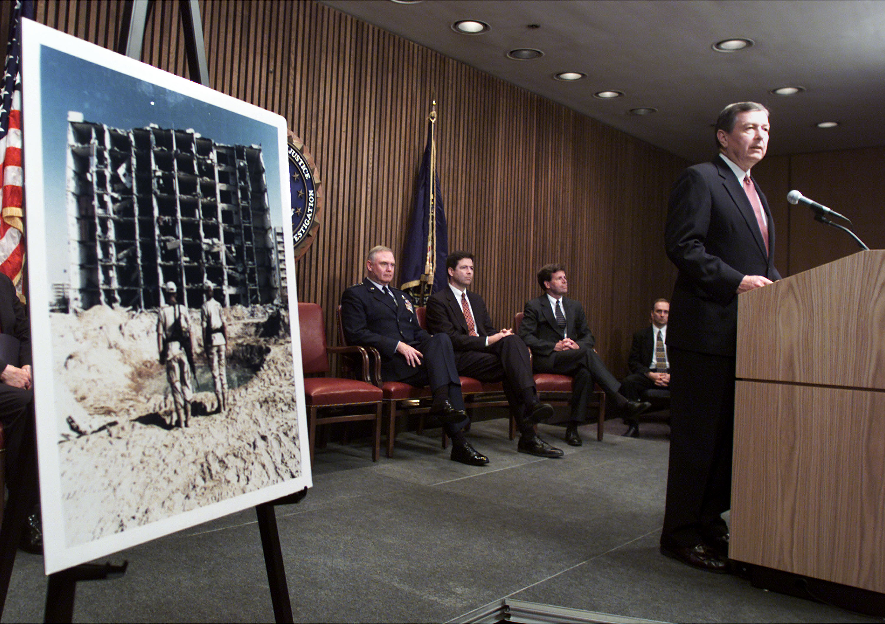 Photo above: Attorney Genaral John Ashcroft announces the indictments of 13 Saudis and one Lebanese in connection with the 1996 Khobar Towers bombing that killed 19 American servicemen in Saudi Arabia on June 21, 2001 at the FBI Headquarters in Washington, DC. Photo by Mark Wilson/Getty Images.