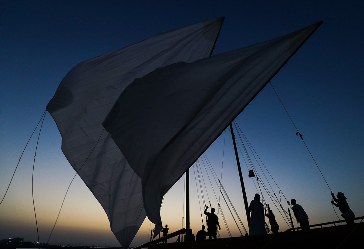 Emiratis competitors sail a traditional dhow during the Marwah Traditional Dhow Sailing race, as part of Al-Dhafra Water Festival, off the coast of al-Mirfa beach, outside Abu Dhabi on April 20, 2018. (Photo by KARIM SAHIB / AFP) (Photo credit should read KARIM SAHIB/AFP via Getty Images)