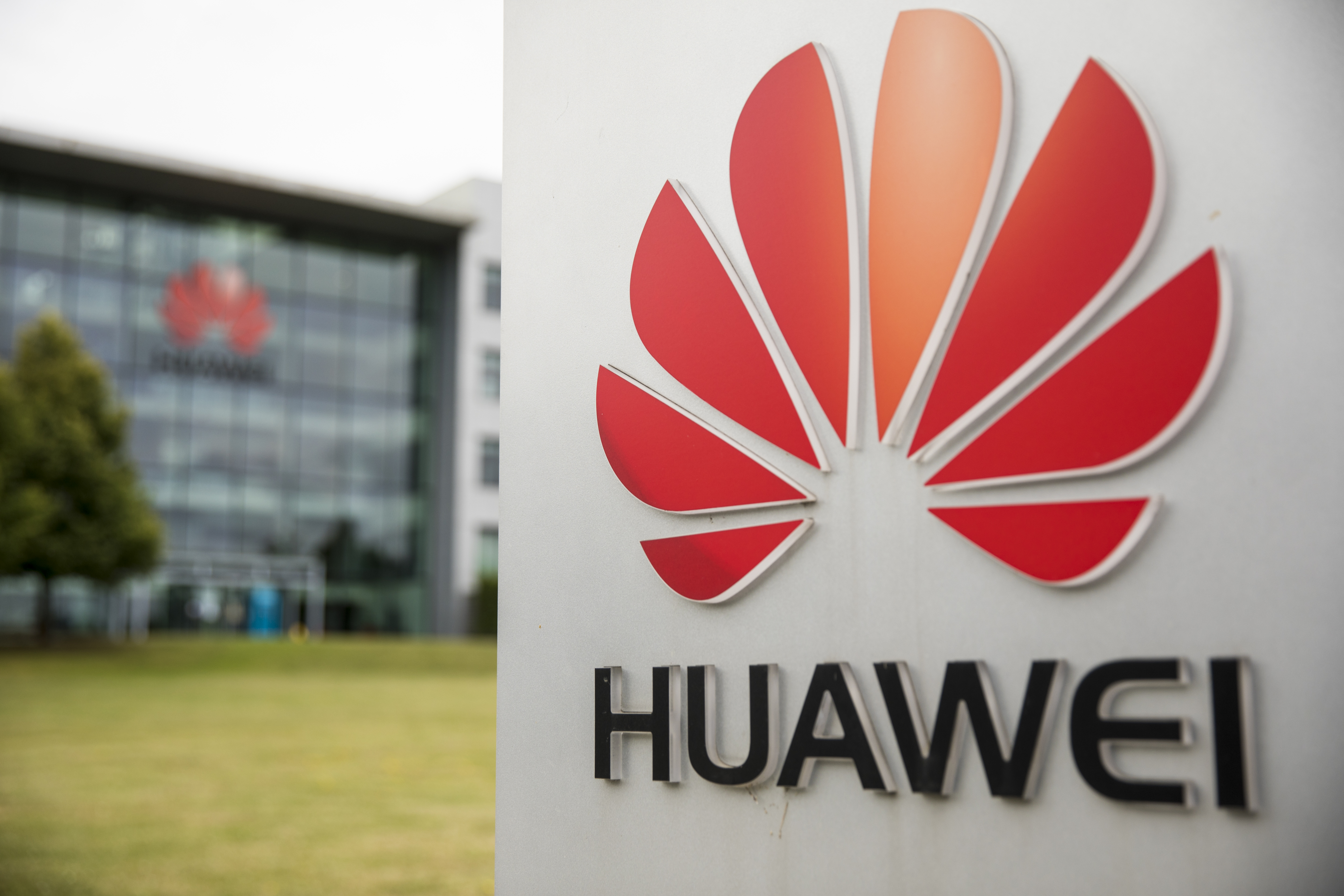 A Huawei Technologies Co. logo at the company’s offices in Reading, UK. Photo by Jason Alden/Bloomberg via Getty Images.