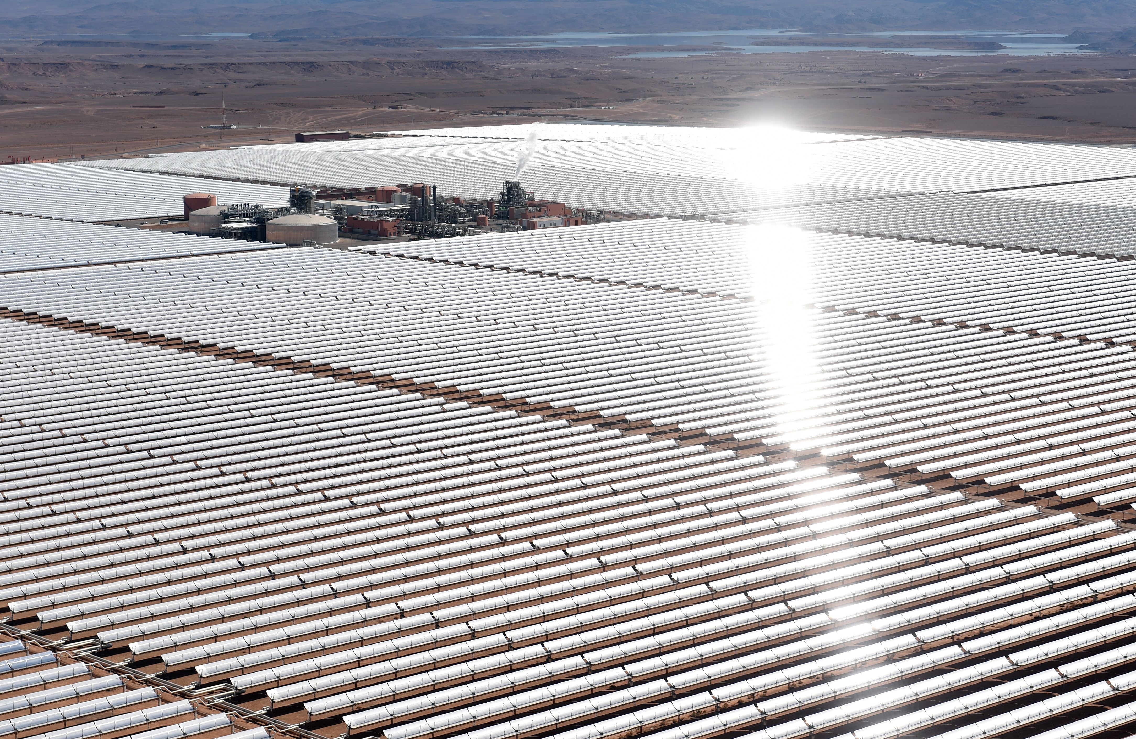 An aerial view of the solar mirrors at the Noor 1 Concentrated Solar Power plant, some 20 km outside the central Moroccan town of Ouarzazate on February 4, 2016. Photo by FADEL SENNA/AFP via Getty Images.