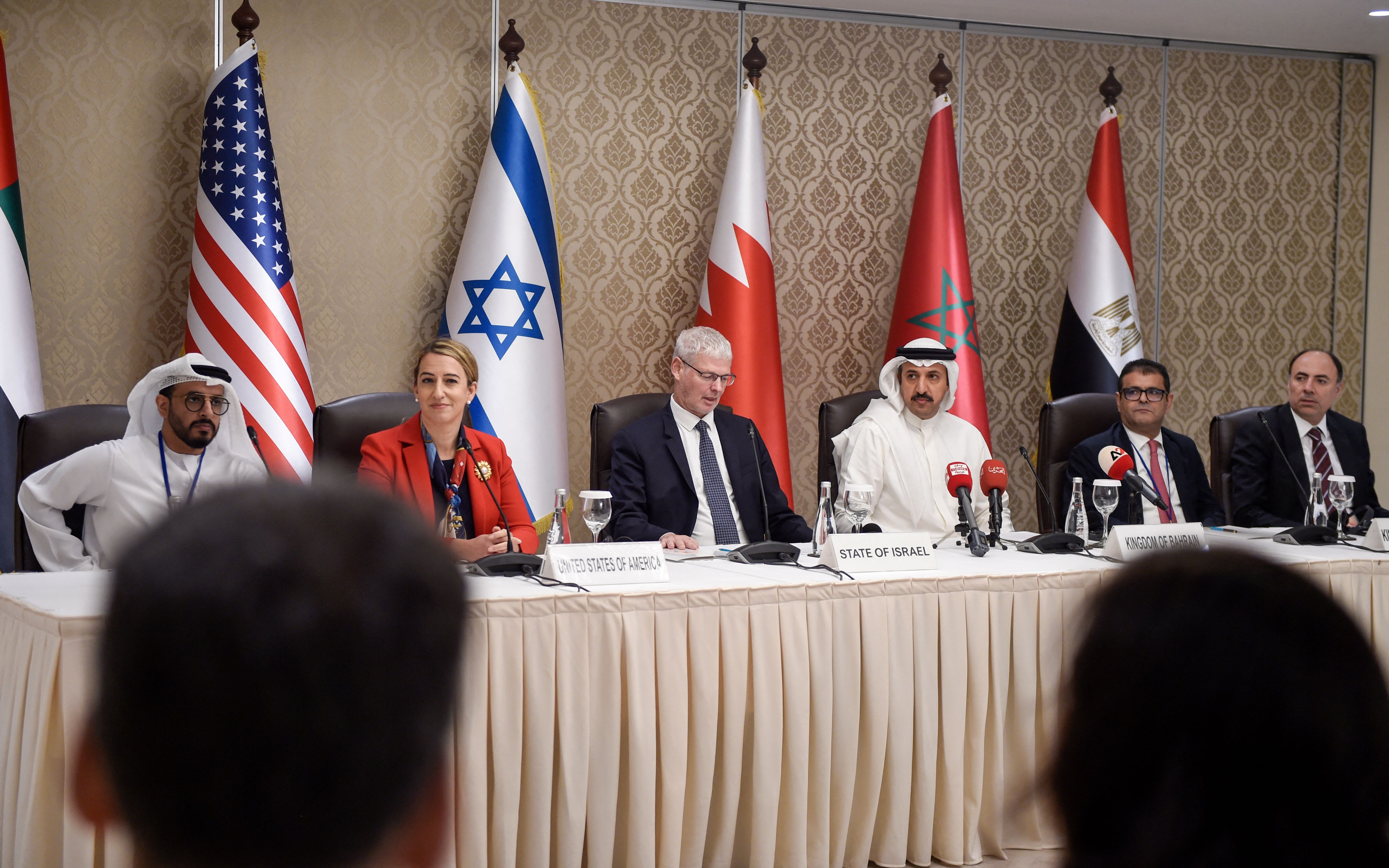 Officials from the UAE, the U.S., Israel, Bahrain, Morocco, and Egypt hold a joint press conference for the Negev Forum’s first Steering Committee meeting in Zallaq, Bahrain on June 27, 2022. Photo by MAZEN MAHDI/AFP via Getty Images.