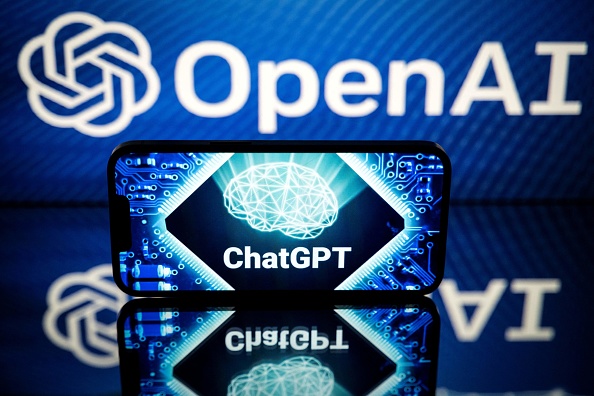 Logos of OpenAI and ChatGPT displayed on screens. Photo by Lionel Bonaventure/AFP via Getty Images.