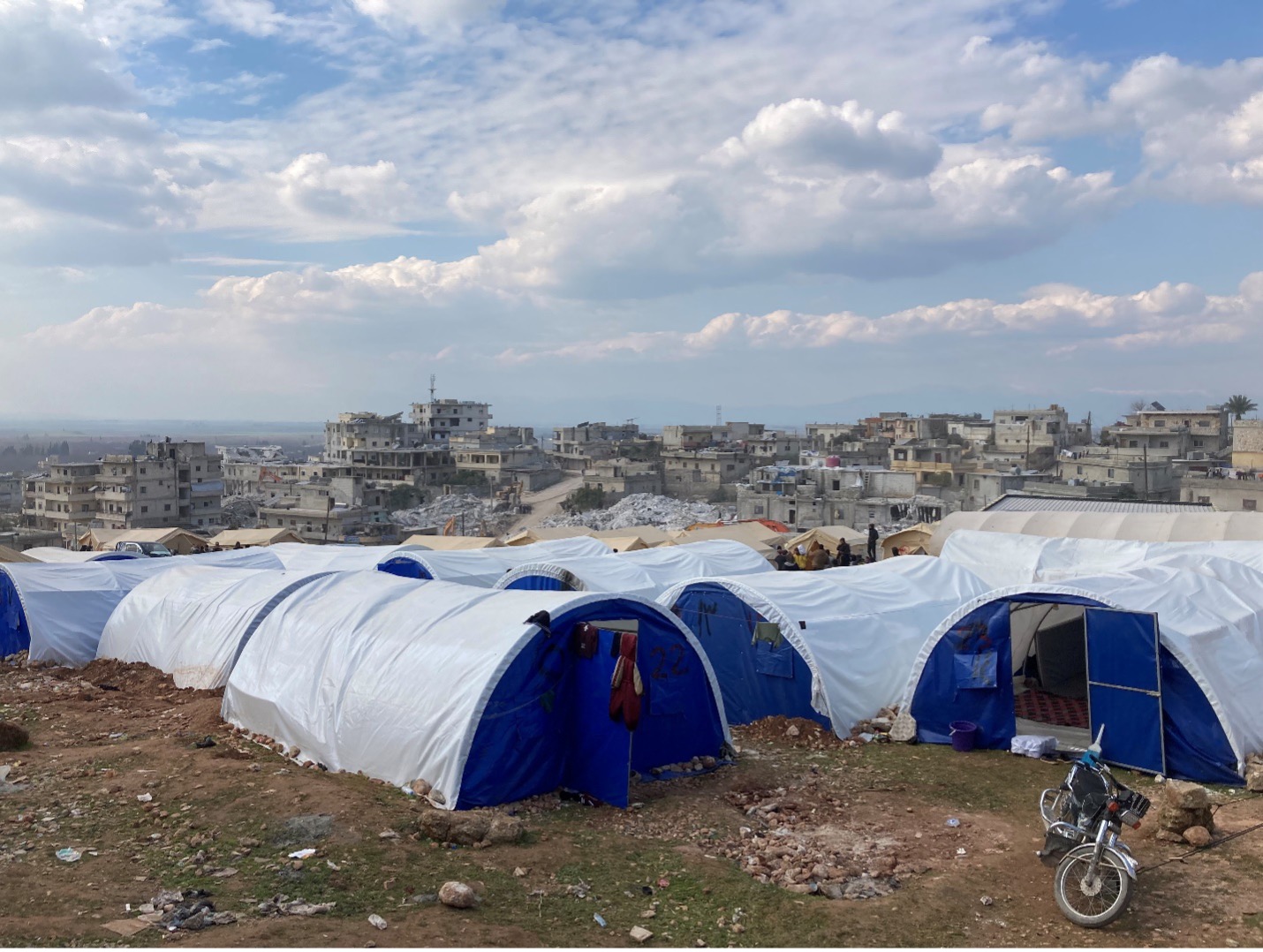 Those whose homes collapsed or are too dangerous to live in have been relocated to nearby camps. Camps like this one in Harem are set up and overseen by the MDHA. In every town I visited, from Maland to Atareb, I saw different NGOs delivering blankets and food to residents. 