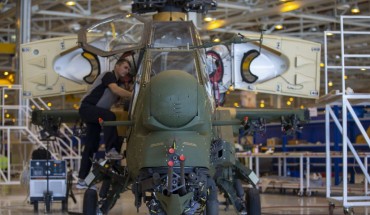 Staff of Turkish Aerospace Industries Inc. works on a helicopter in Ankara, Turkey on July 13, 2018. 