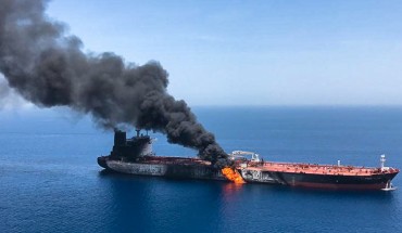 This photo reportedly shows fire and smoke billowing from Norwegian owned Front Altair tanker said to have been attacked in the waters of the Gulf of Oman
