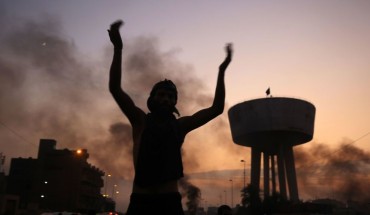An Iraqi protester chants slogans during a demonstration against state corruption, failing public services and unemployment at Tayaran square in Baghdad on October 2, 2019.