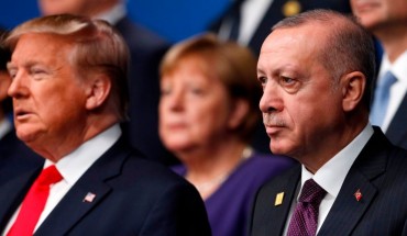 US President Donald Trump (L) and Turkey's President Recep Tayyip Erdogan (R) pose for the family photo at the NATO summit at the Grove hotel in Watford, northeast of London on December 4, 2019.