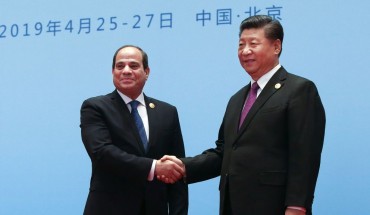 China's President Xi Jinping (R) welcomes Egypt's President Abdel Fattah el-Sisi at the Second Belt and Road Forum. 