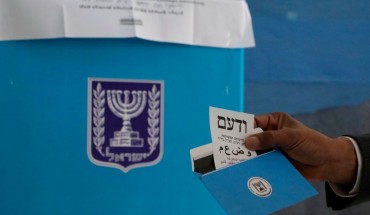 Arab Israeli MP and Arab Joint List candidate Said al-Harumi votes in the Bedouin town of Segev Shalom or Shaqib al-Salam near the southern Israeli city of Beersheva on March 2, 2020. 