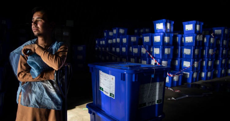  Afghan workers move ballot boxes to trucks getting ready for the Presidential elections in five days in Kabul, Afghanistan on September 23, 2019. 