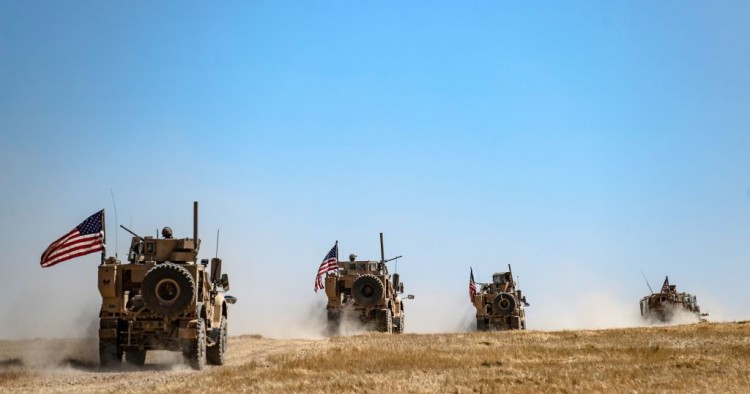 A US military convoy takes part in joint patrol with Turkish troops in the Syrian village of al-Hashisha on the outskirts of Tal Abyad town along the border with Turkish troops, on September 8, 2019.