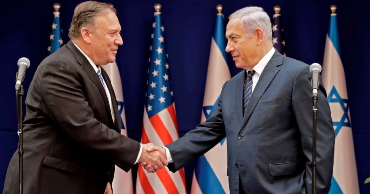 Israeli Prime Minister Benjamin Netanyahu (R) shakes the hand of US Secretary of State Mike Pompeo following their meeting in Jerusalem on October 18, 2019. 