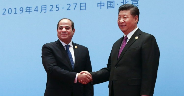 China's President Xi Jinping (R) welcomes Egypt's President Abdel Fattah el-Sisi at the Second Belt and Road Forum. 