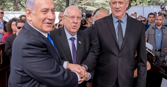 Israeli Prime Minister Benjamin Netanyahu (L), President Reuven Rivlin (C) and Benny Gantz, leader of Blue and White party, attend a memorial ceremony for late Israeli president Shimon Peres, at Mount Herzl in Jerusalem on September 19, 2019. 