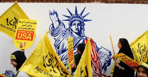  People gather in front of the former US Embassy building to stage a protest against United States due to the 40th anniversary of the occupation of former US Embassy building in Tehran, Iran on November 04, 2019.