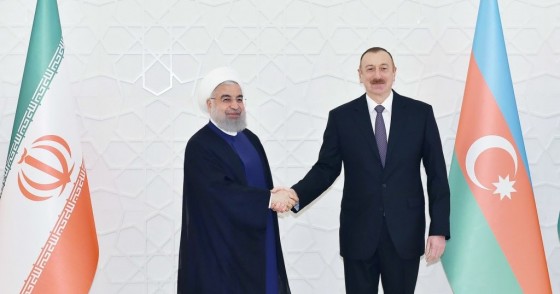  Iranian President Hassan Rouhani (L) meets President of Azerbaijan Ilham Aliyev (R) during his official visit in Baku, Azerbaijan on March 28, 2018. 