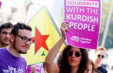 sraelis demonstrate against the Turkish military offensive in northeastern Syria on October 17, 2019 in front of the Turkish embassy in the Israeli coastal city of Tel Aviv.