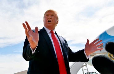 US President Donald Trump speaks as he arrives at Naval Air Station Joint Reserve Base Forth Worth in Texas on October 17, 2019. 