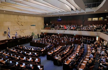 A picture taken on October 3, 2019 shows a general view of the plenum during the swearing-in ceremony at the Knesset in Jerusalem. - Israel's parliament was sworn in today without a new government formed as a deadlocked general election left Netanyahu scrambling to find a path to extend his long tenure in power.
