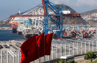 This picture taken on June 28, 2019 shows a view of container cranes at terminal I of the Tanger Med port in the northern city of Tangiers on the Strait of Gibraltar