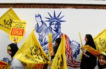  People gather in front of the former US Embassy building to stage a protest against United States due to the 40th anniversary of the occupation of former US Embassy building in Tehran, Iran on November 04, 2019.