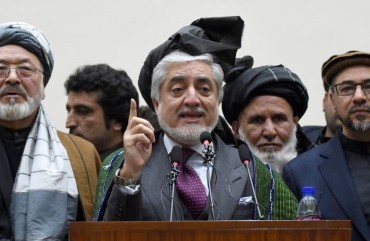 Afghan presidential election opposition candidate Abdullah Abdullah (C) gestures as he takes part in a press conference after the announcement of the final presidential elections results at the Sapedar Palace in Kabul on February 18, 2020.