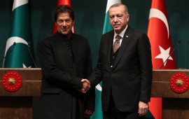 Turkish President Recep Tayyip Erdogan (R) and Pakistani Prime Minister Imran Khan (L) shake hands after a joint press conference at the Presidential Complex in Ankara, on January 4, 2019.