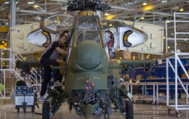 Staff of Turkish Aerospace Industries Inc. works on a helicopter in Ankara, Turkey on July 13, 2018. 