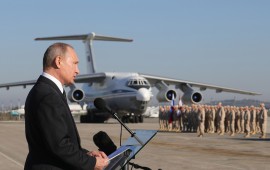 LATAKIA, SYRIA DECEMBER 11, 2017: Russia's President Vladimir Putin addresses Russian forces at the Russian Hmeimim air base. Putin has ordered Russian troops to start pulling out of Syria. Mikhail Klimentyev/Russian Presidential Press and Information Office/TASS (Photo by Mikhail Klimentyev\TASS via Getty Images)