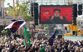 Shiite Muslims watch a televised speech by Hassan Nasrallah, the Lebanese Shiite Hezbollah movement leader, in the city of Baalbek in Lebanon's eastern Bekaa Valley on October 19, 2019.