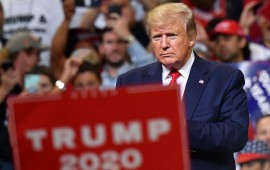 US President Donald Trump looks on during a rally at the Amway Center in Orlando, Florida to officially launch his 2020 campaign on June 18, 2019.