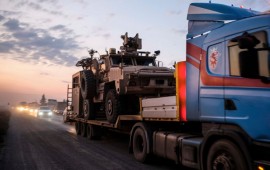 A convoy of U.S. armored military vehicles leave Syria on a road to Iraq on October 19, 2019 in Sheikhan, Iraq.