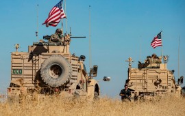 A convoy of US military vehicles drives near the town of Tal Tamr in the northeastern Syrian Hasakeh province on the border with Turkey, on November 10, 2019.
